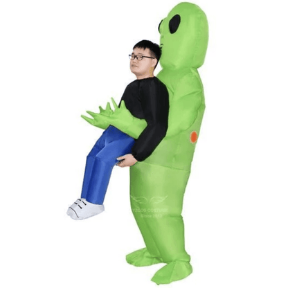 Green Alien Carrying Human Costume - WikiWii