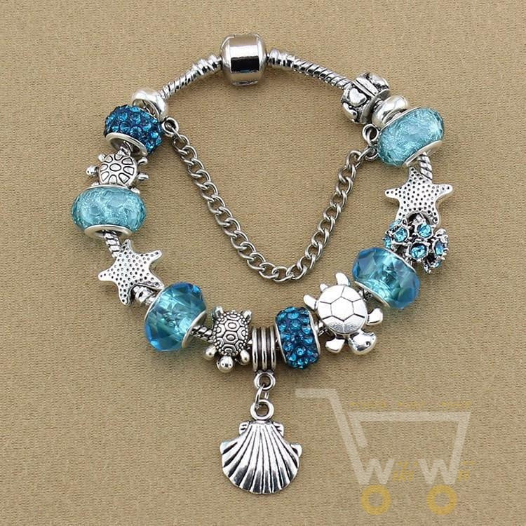 Blue crystal/Glass bracelet Sea turtle with starfish shell - WikiWii