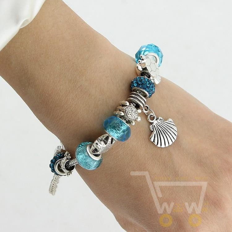 Blue crystal/Glass bracelet Sea turtle with starfish shell - WikiWii