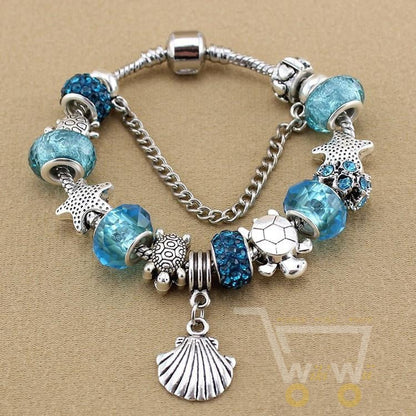 Blue crystal/Glass bracelet Sea turtle with starfish shell - WikiWii