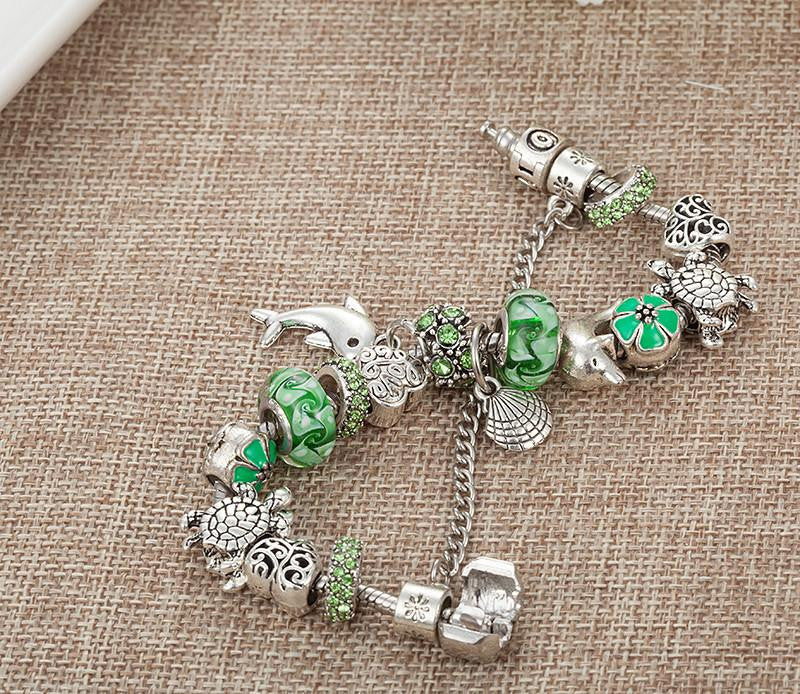 New Design Dolphins/Turtle Charm Green Glass Beads Bracelet - WikiWii