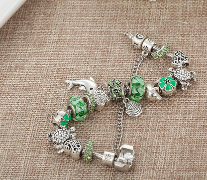 New Design Dolphins/Turtle Charm Green Glass Beads Bracelet - WikiWii