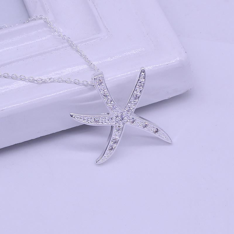 Silver Plated Starfish Necklace with purple crystals - WikiWii