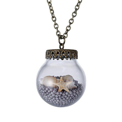 Starfish in a glass jar necklace - WikiWii