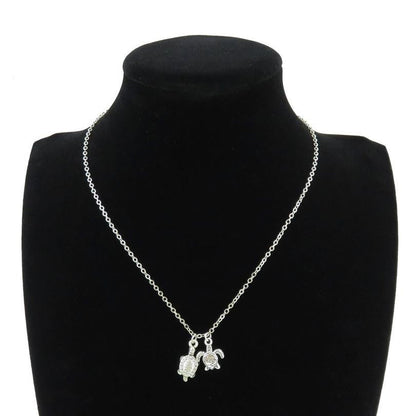 Two Cute Silver Sea Turtles Necklace - WikiWii